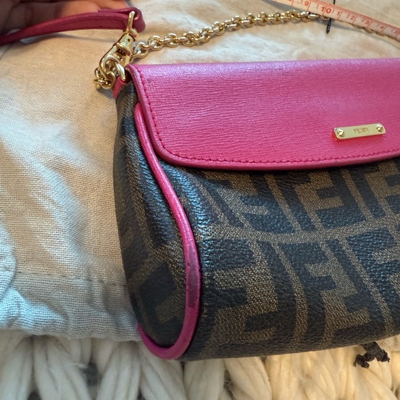 Authentic FENDI 2015 Zucca Pink cyclamin & Tobacco
Mini Pouch wt box and tags - Picture 11 of 16